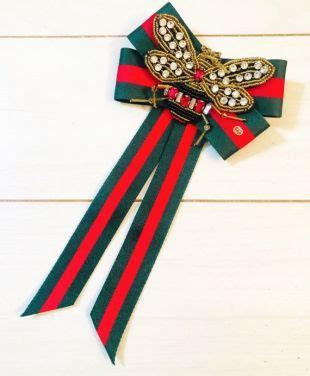 gucci replica brooch|Gucci ribbon brooch for sale.